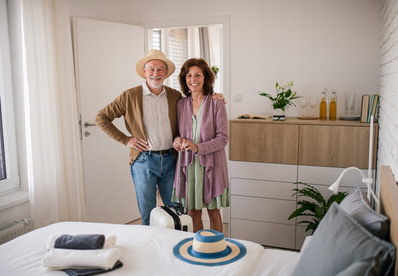 Elderly Couple Moving into Senior Assisted Living Apartment Elderly Couple Moving into Senior Assisted Living Apartment
